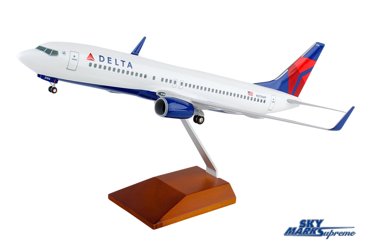SKYMARKS DELTA 737-800 1/100 W/GEAR & WOOD STAND The Airplane Shop.