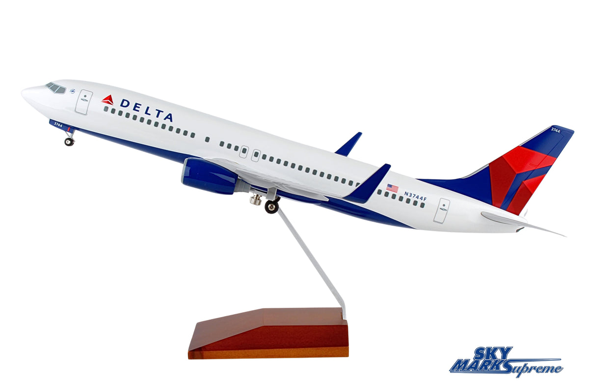 SKYMARKS DELTA 737-800 1/100 W/GEAR & WOOD STAND The Airplane Shop.