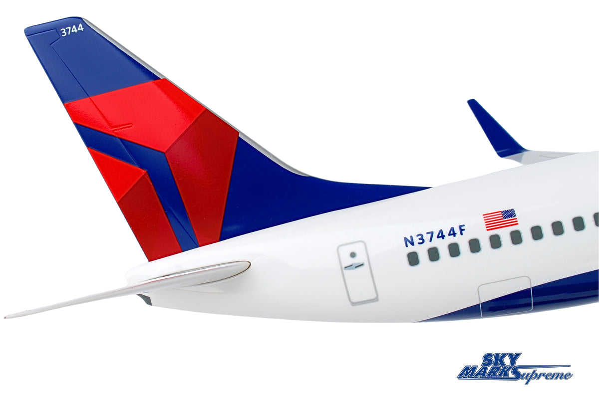 SKYMARKS DELTA 737-800 1/100 W/GEAR & WOOD STAND The Airplane Shop.
