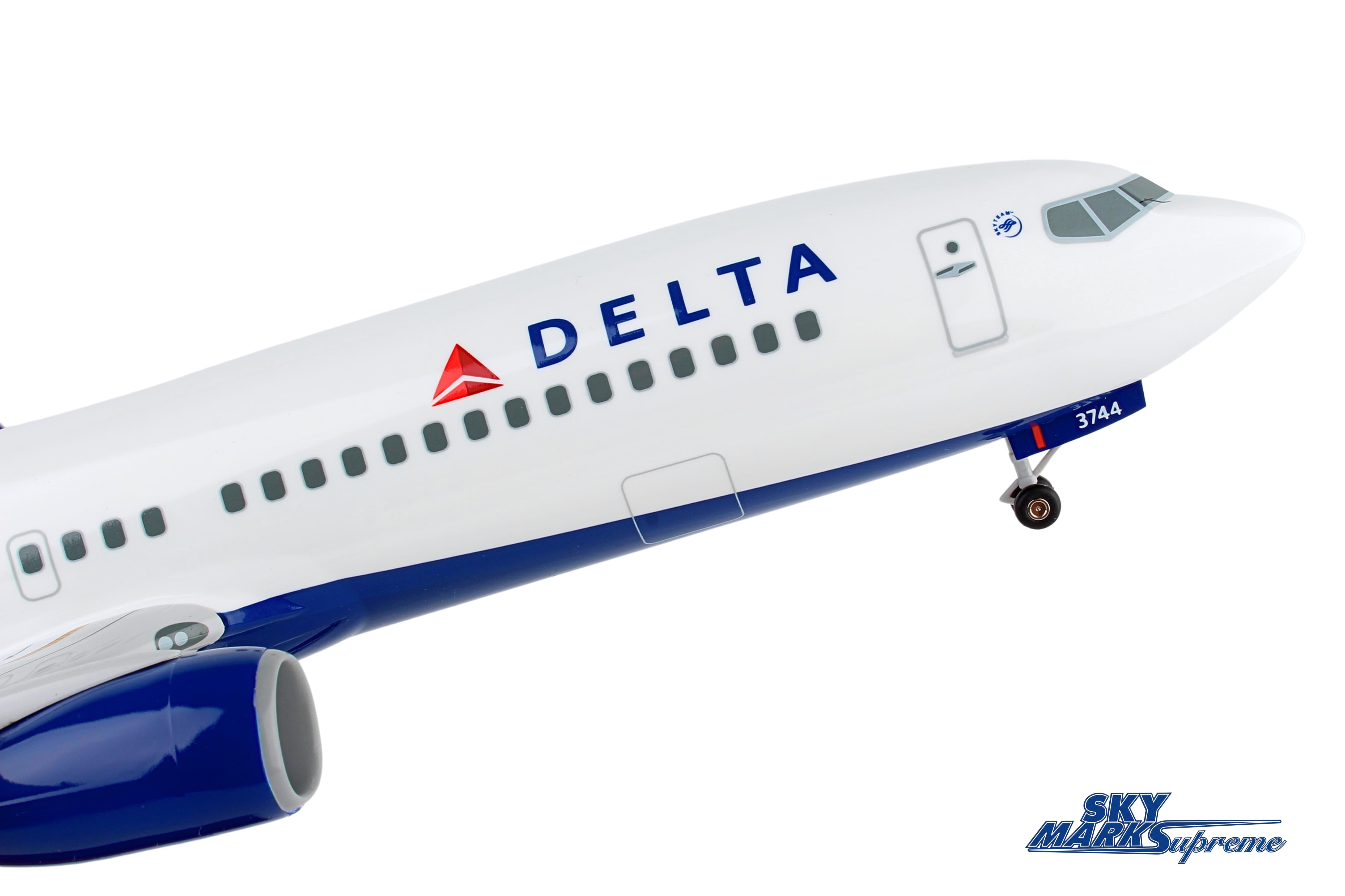 SKYMARKS DELTA 737-800 1/100 W/GEAR & WOOD STAND The Airplane Shop.