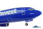 SKYMARKS SOUTHWEST 737-800 1/100 W/GEAR & WOOD STAND HEART The Airplane Shop.