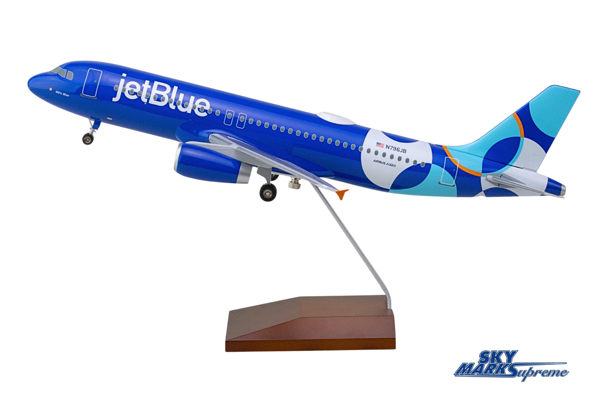 SKYMARKS JETBLUE A320 1/100 SPOTLIGHT W/WOOD STAND & GEAR The Airplane Shop.