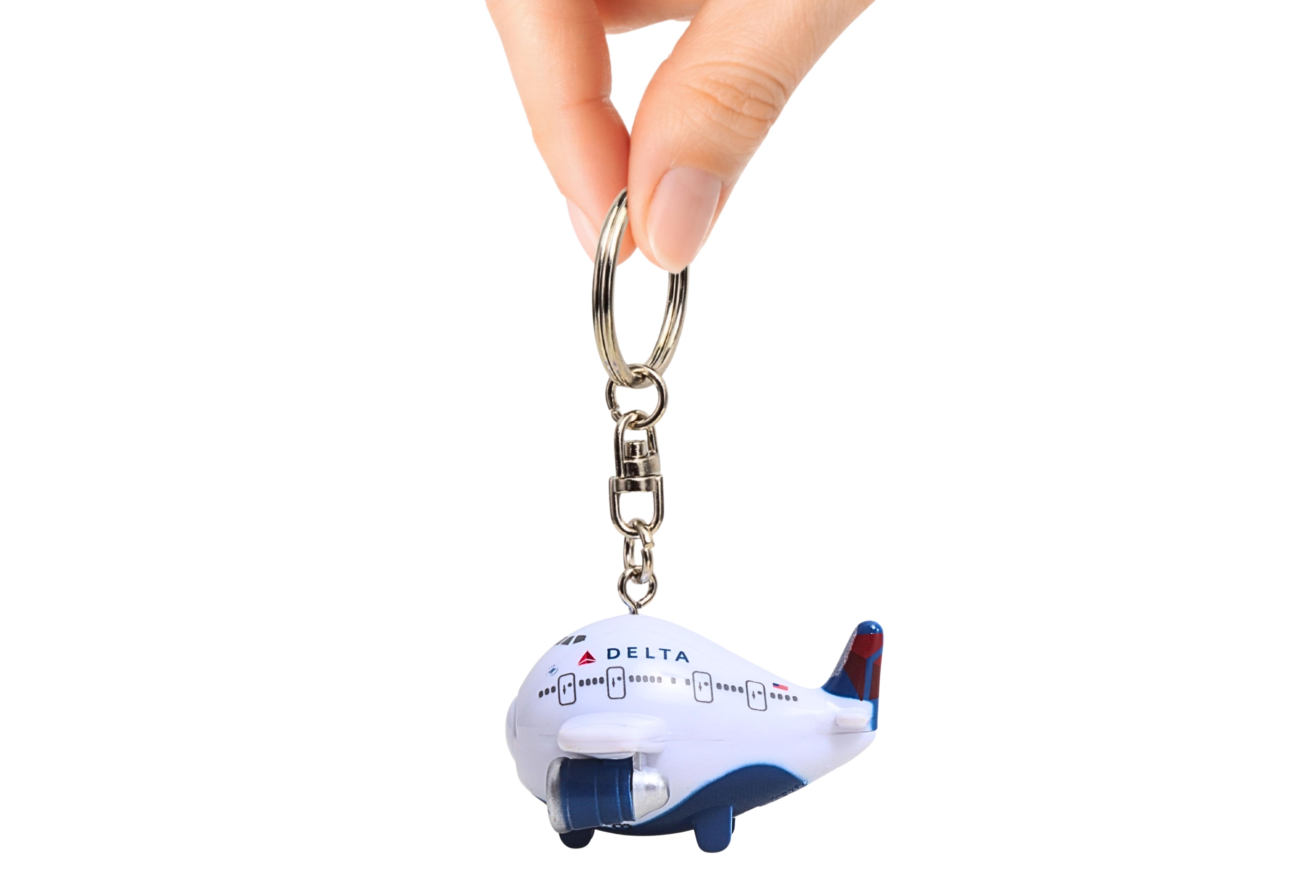DELTA KEYCHAIN W/LIGHT & SOUND (**)