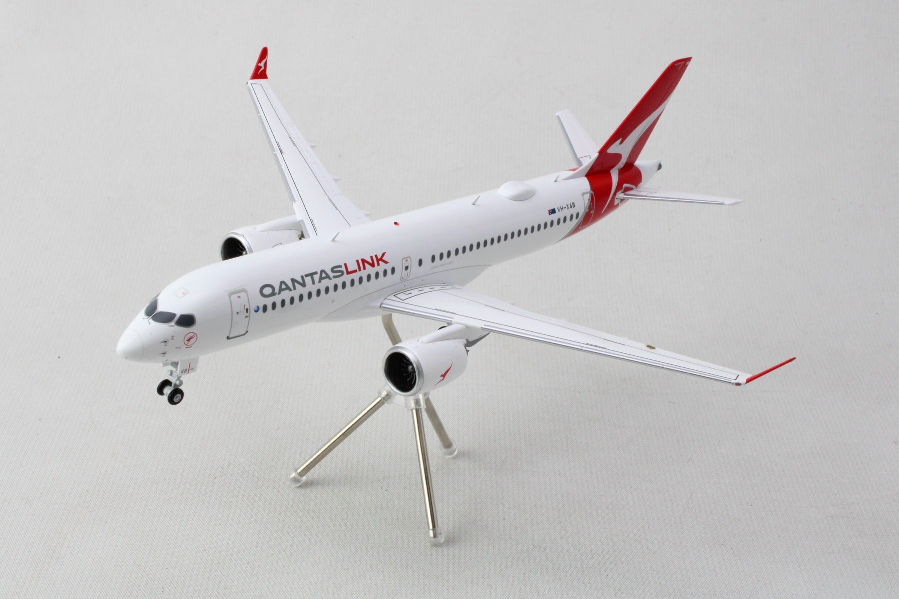 GEMINI200 QANTASLINK A220-300 1/200 REG#VH-4XB